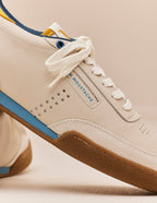 Baskets basses Anatole - Cuir écru moutarde bleu